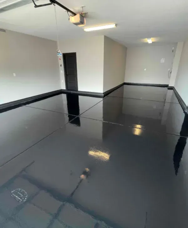 Garage with black high-gloss epoxy-coated floor